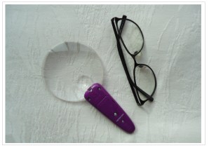 magnifier and glasses