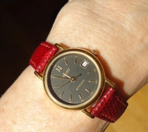 watch with red strap